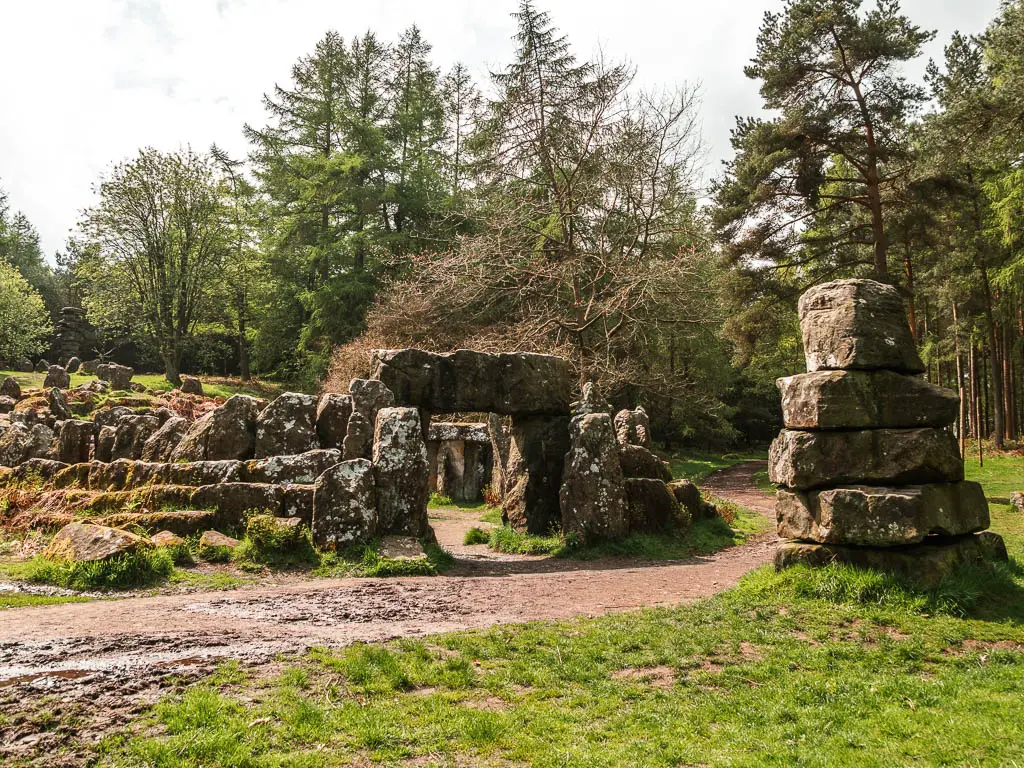 The rocks of Druid's Temple with a dirt walking trail around it.