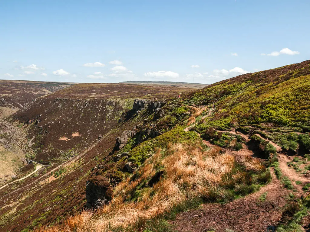 A rugged dirt trail on the side of the hill, on the walk away from the Trinnacle.