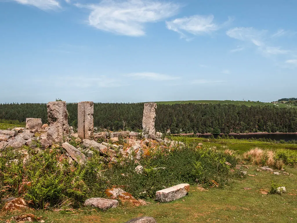 Stone ruins on the green, along the Langsett Reservoir walking route.