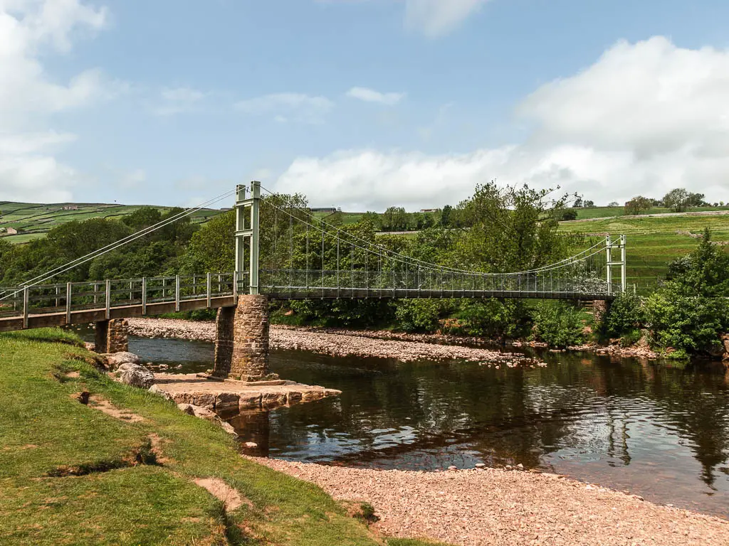 Looking towards the suspension bridge over the river, on the walk back to Reeth. 