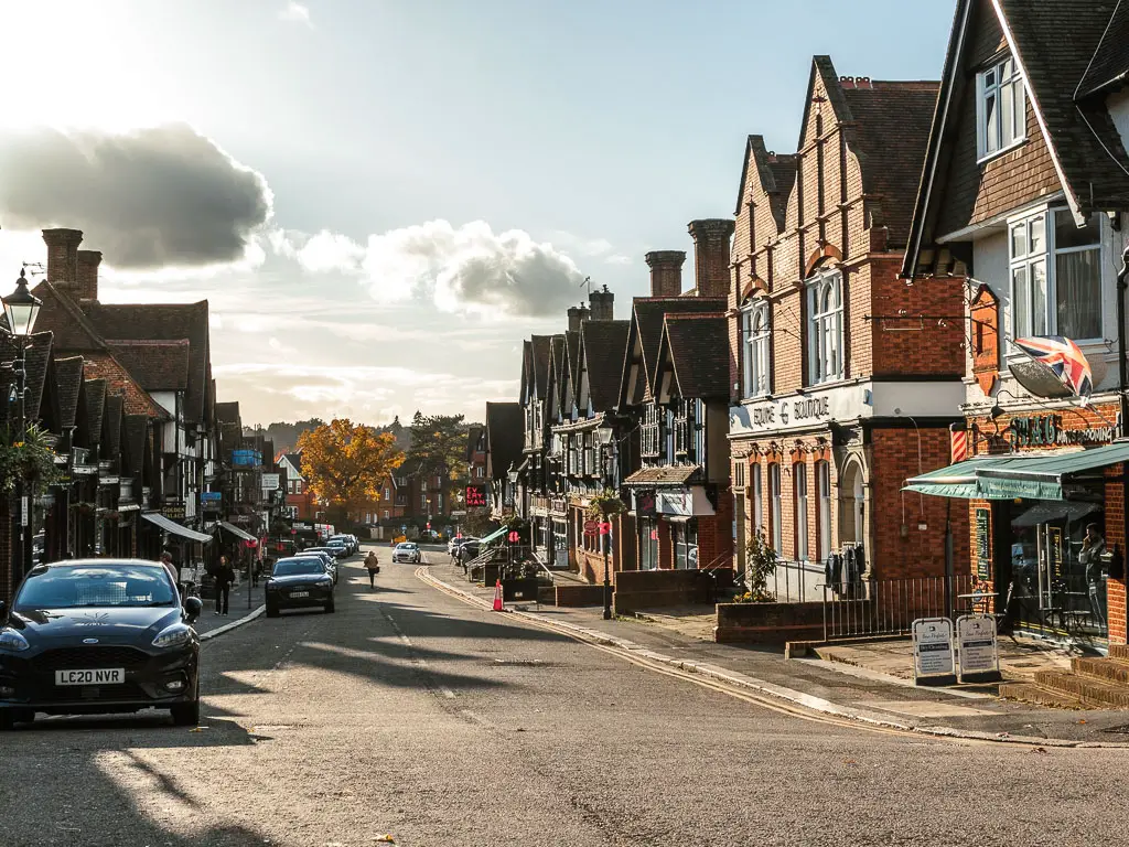 Looking along a road lined with various shops and buildings at Oxted, at the end of the walk from Merstham. 