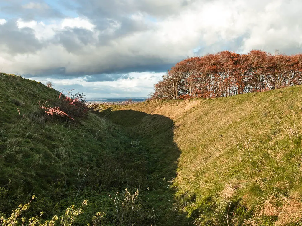 Looking through the defence ditch of Barbury Castle, when walking between Avebury and Ogbourne St George.