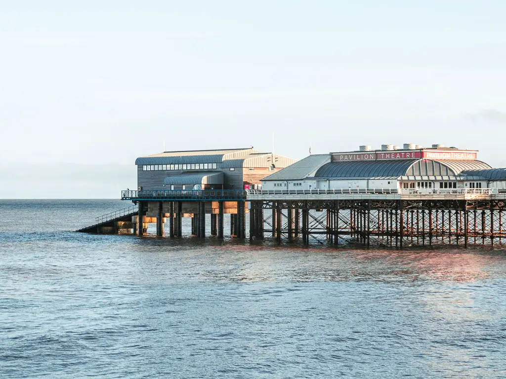 Looking towards the Cromer pier jutting out into the sea, at the start of the walk towards Mundesley.