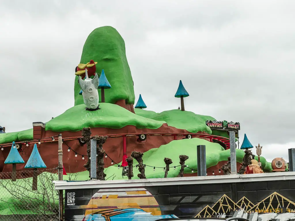 A big lime green fairground ride.