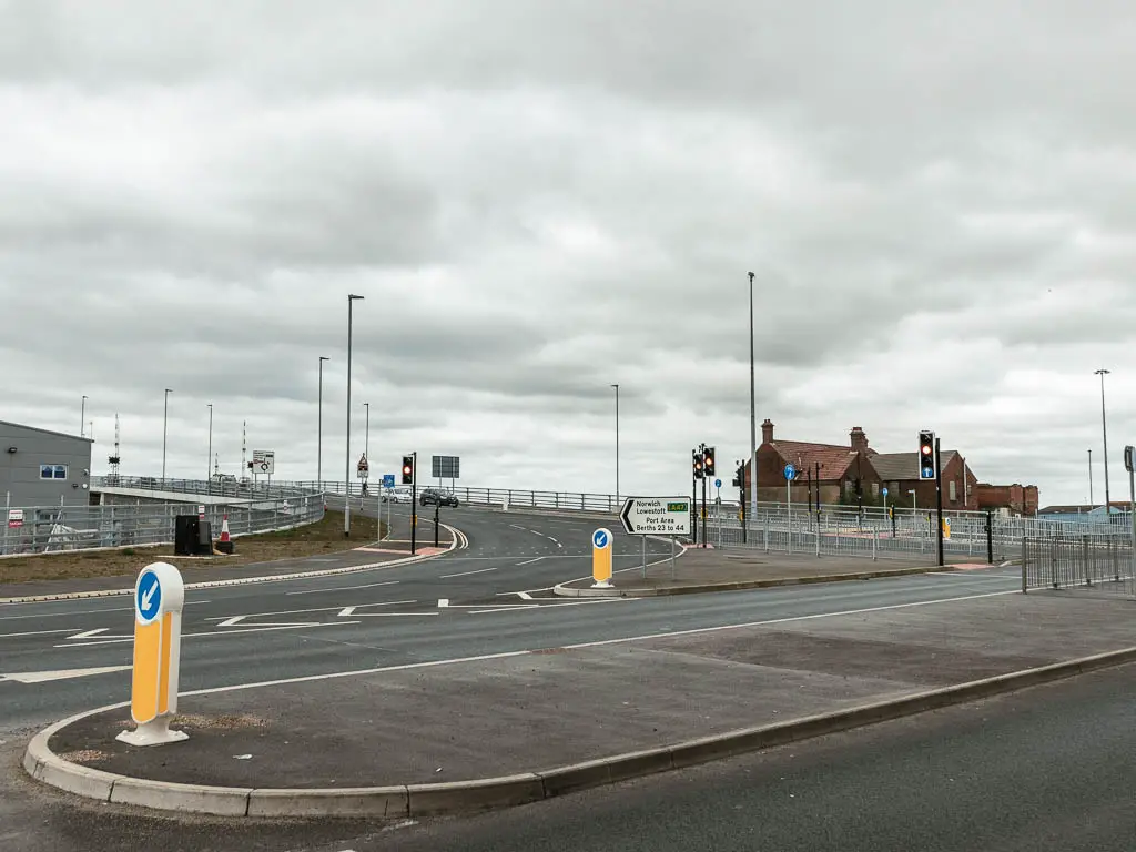 A road junction leading to the bridge ahead. 