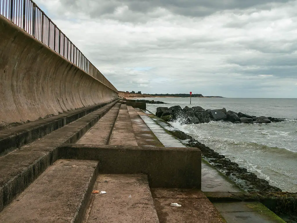 Steps leading along the sea walk, with the right sea to the right.